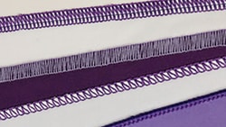 Baby Lock Acclaim uses four, three, or two thread combinations for a variety of stitches