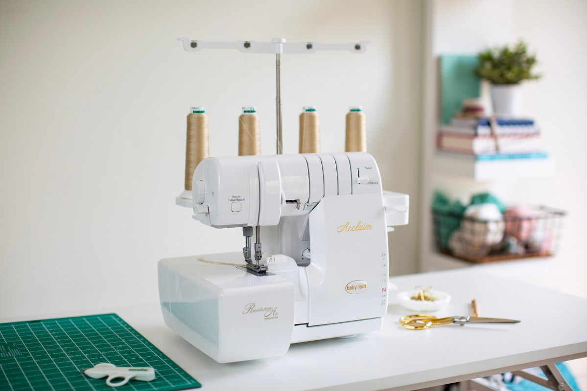 Baby Lock Acclaim air-threading serger on sewing table