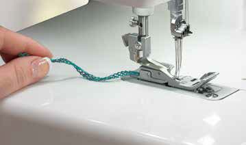 Baby Lock Triumph automatically chains off coverstitch