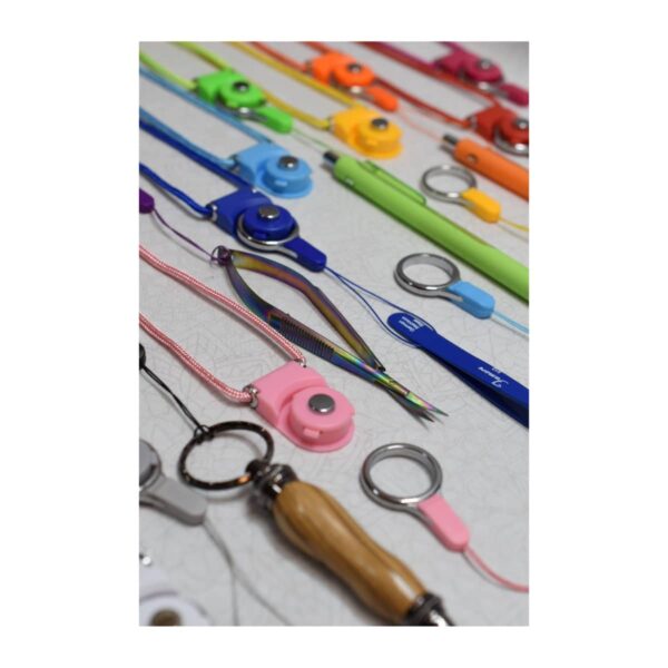 Sew Steady Sariditty Crafter's Notion Necklace holding tweezers