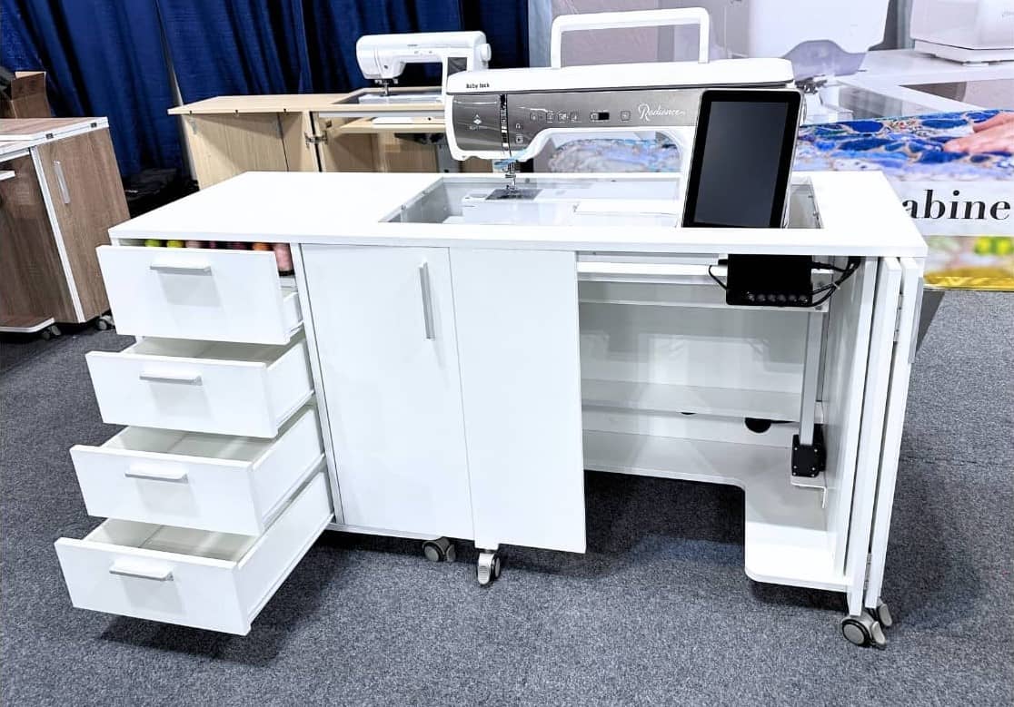Hideaway Deluxe XL Sewing Cabinet with Sewing Machine on lift and one door open